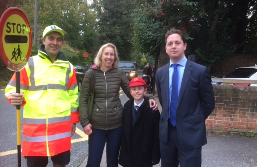 Alex Burghart MP with St Peter's School Head, Iain Gunn, on school crossing patrol