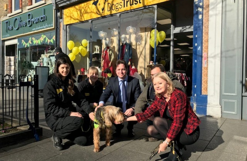 Alex Burghart MP with staff and furry customer at Dogs Trust Shop, Brentwood