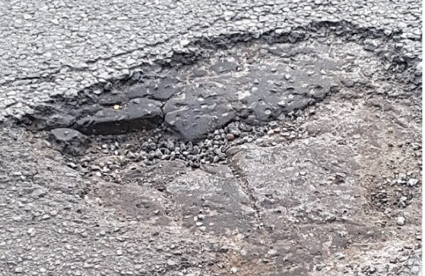 Alex Burghart MP Potholes (credit Cat Tierney)