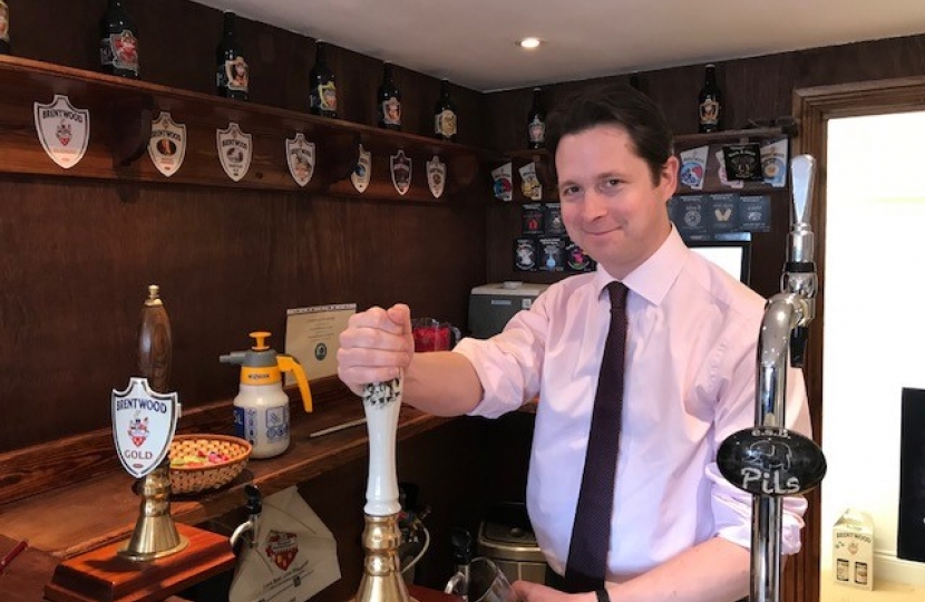 Alex Burghart MP pulls at pint at Brentwood Brewing Company