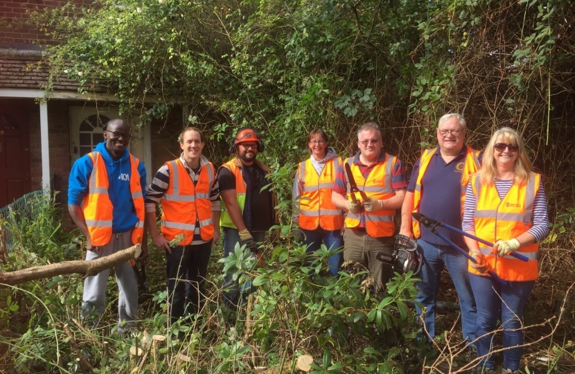 Conservative Councillors help with clearing overgrown gardens