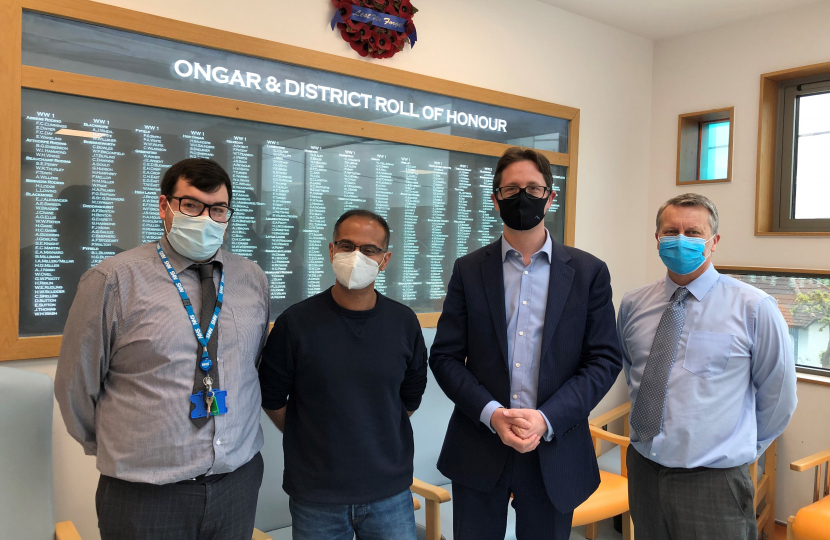 Alex Burghart MP with GP Dr Yaqub and Practice Staff