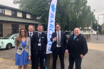 Alex Burghart MP with Barclays staff at St Peter's Church, Hutton