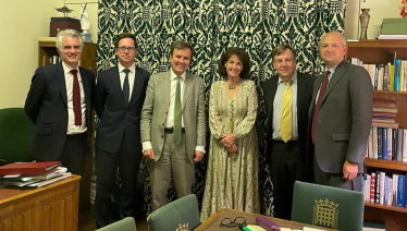 Alex Burghart MP, James Cartlidge and MPs meeting Greg Hands MP