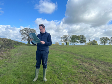 Alex Burghart MP at the proposed site for one of the pylons